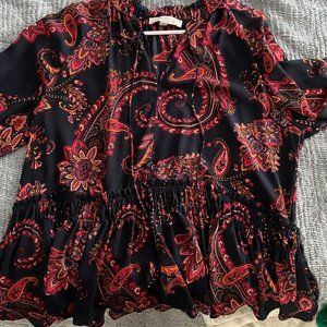 Long sleeved, peplum blouse